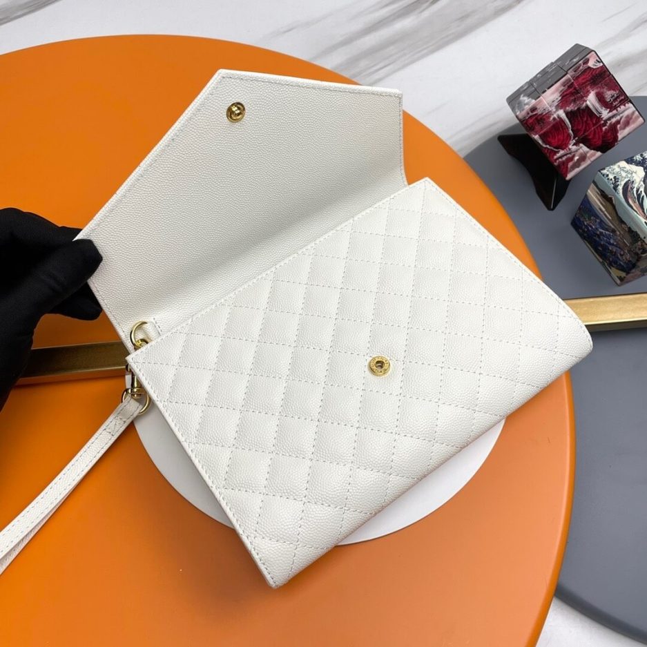 Y51 CASSANDRE matelassé leather flap clutch
