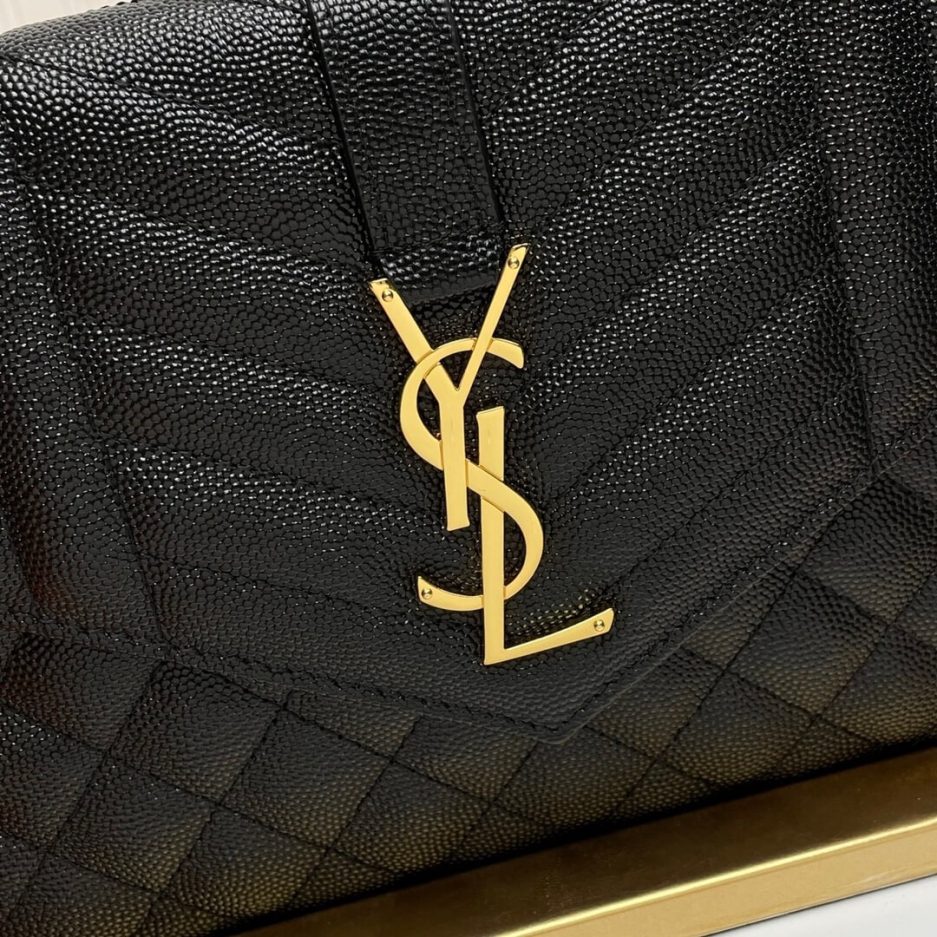 Y51 CASSANDRE matelassé leather flap clutch