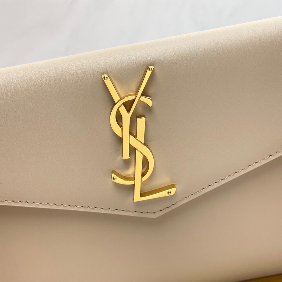 Y51 UPTOWN POUCH IN GRAIN DE POUDRE EMBOSSED LEATHER